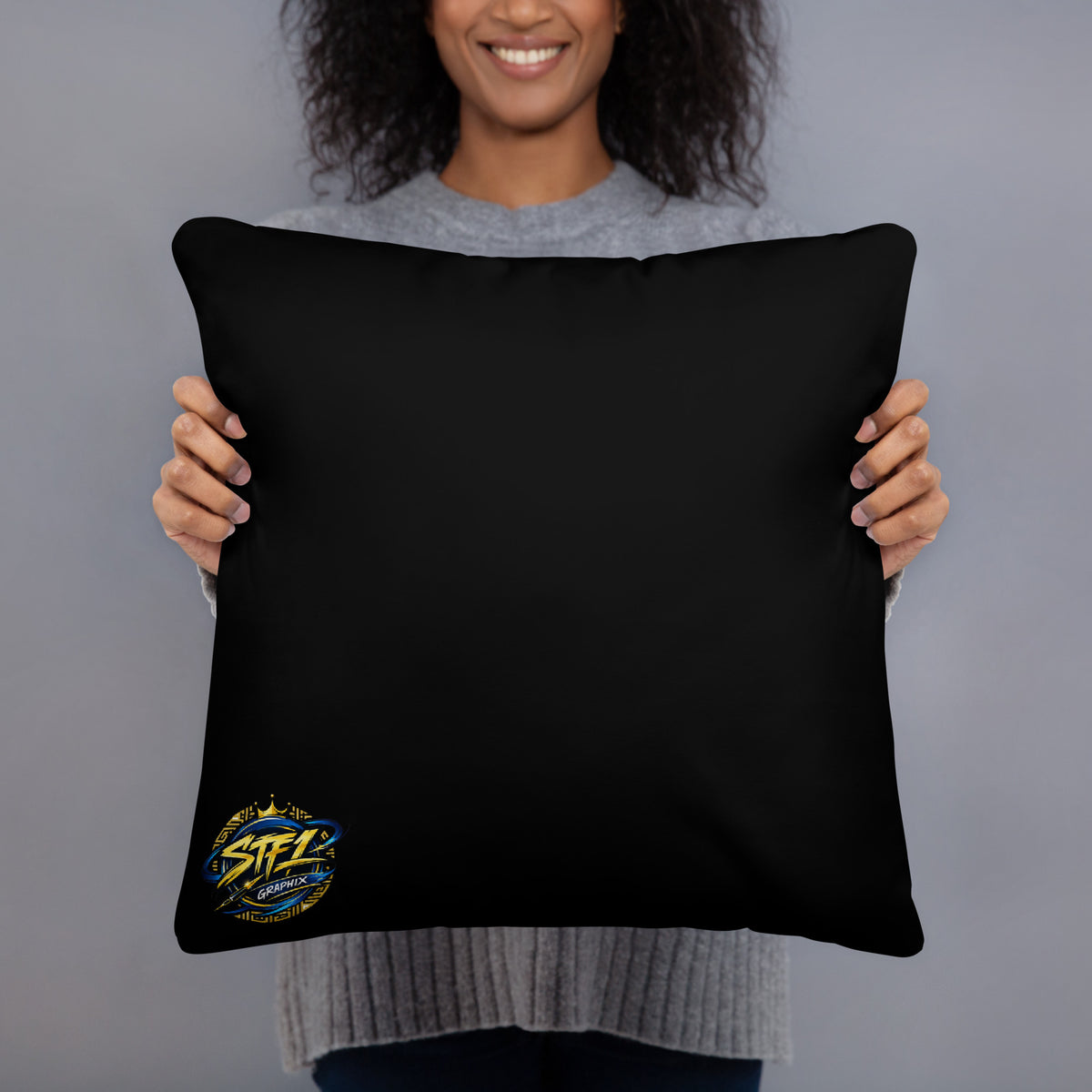 Spoonieverse pillow with STF1 Graphix logo back side view