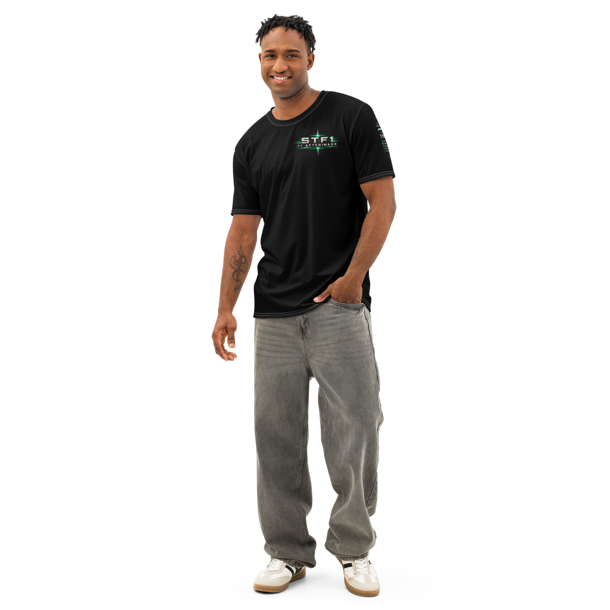 Male model wearing the STF1 Afterimage 001 T-shirt, front view showing the emerald chest design