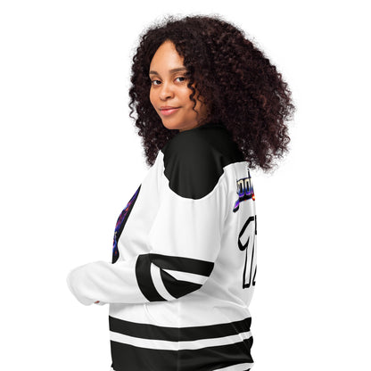 Close-up side view of a model wearing the BW Team Spoonieverse hockey jersey, showing the black shoulder panel and striped sleeve.