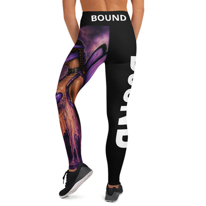 Back view of Bound black yoga leggings with white BOUND lettering on the waistband and purple artwork.