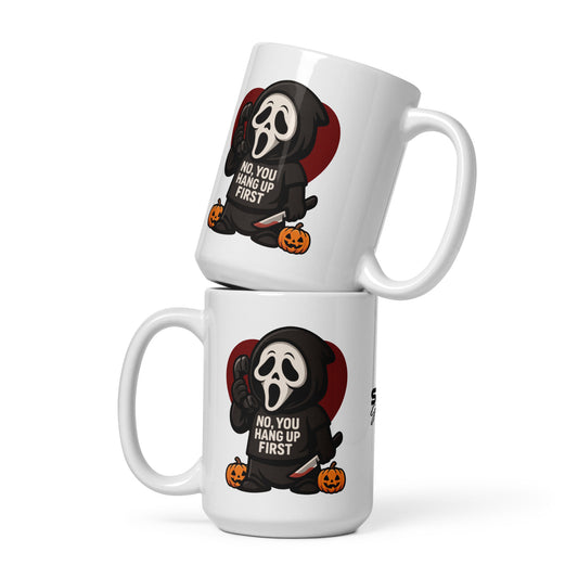 Stacked white Halloween mugs featuring a masked character holding a phone, pumpkins, and the phrase No, You Hang Up First.